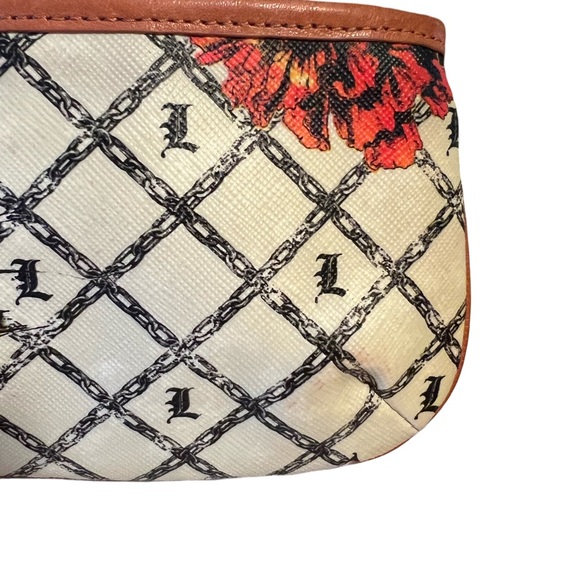 L.A.M.B. Preowned Gwen Stefani Wristlet Wallet
Marigold Floral Graphic  (P069) - Picture 7 of 9